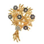 Diamond and sapphire 18ct yellow and white gold set floral spray brooch