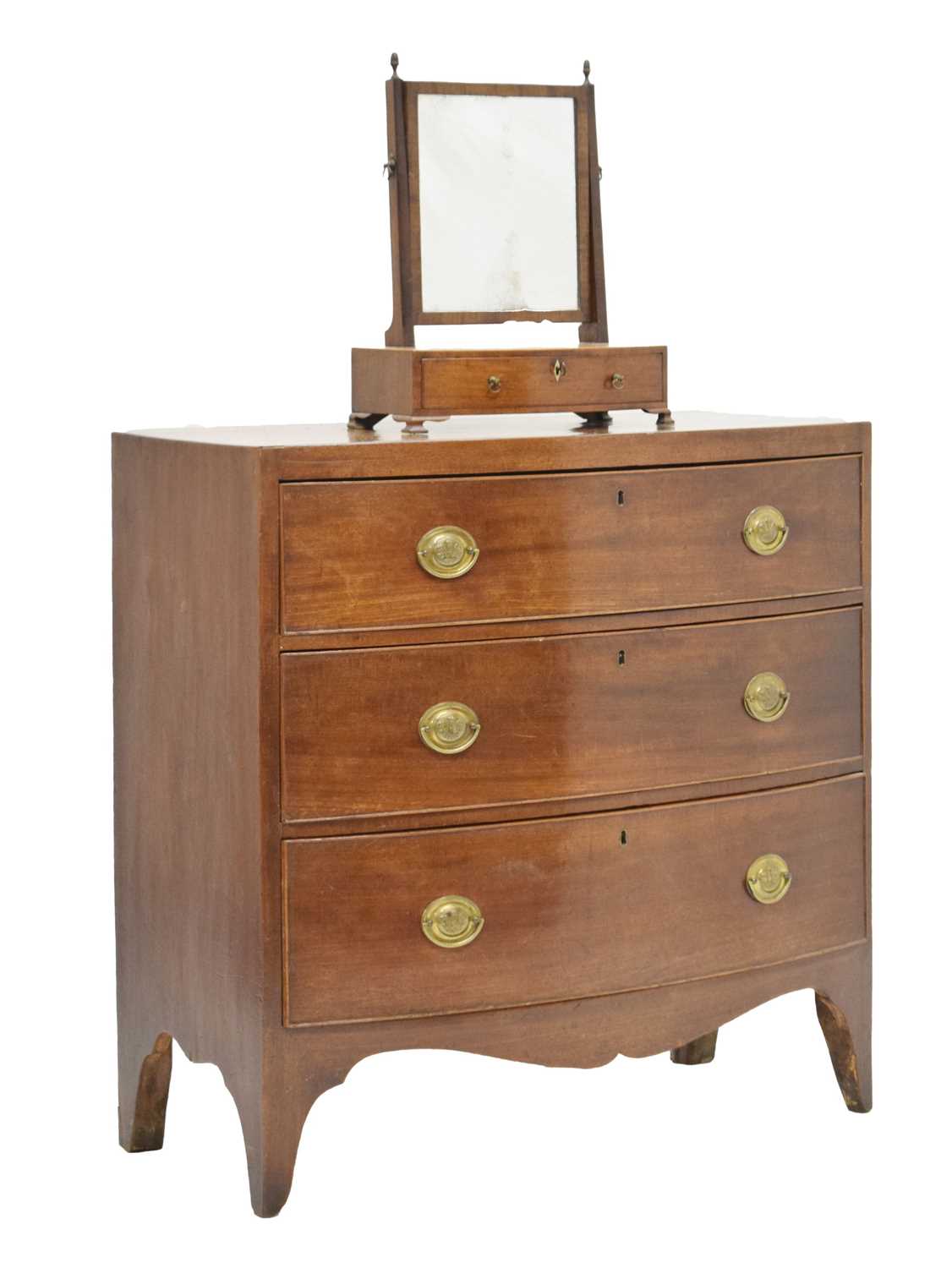 Regency mahogany bowfront chest of three drawers