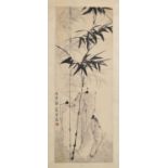 Chinese watercolour scroll painting depicting bamboo with landscape behind