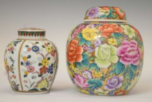 Two Oriental ginger jars with covers