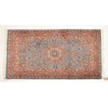 Middle Eastern blue and red ground wool rug