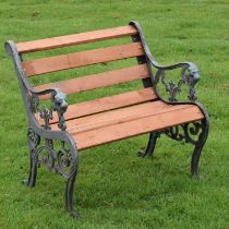 Garden seat having scroll decorated ends with metal lion heads