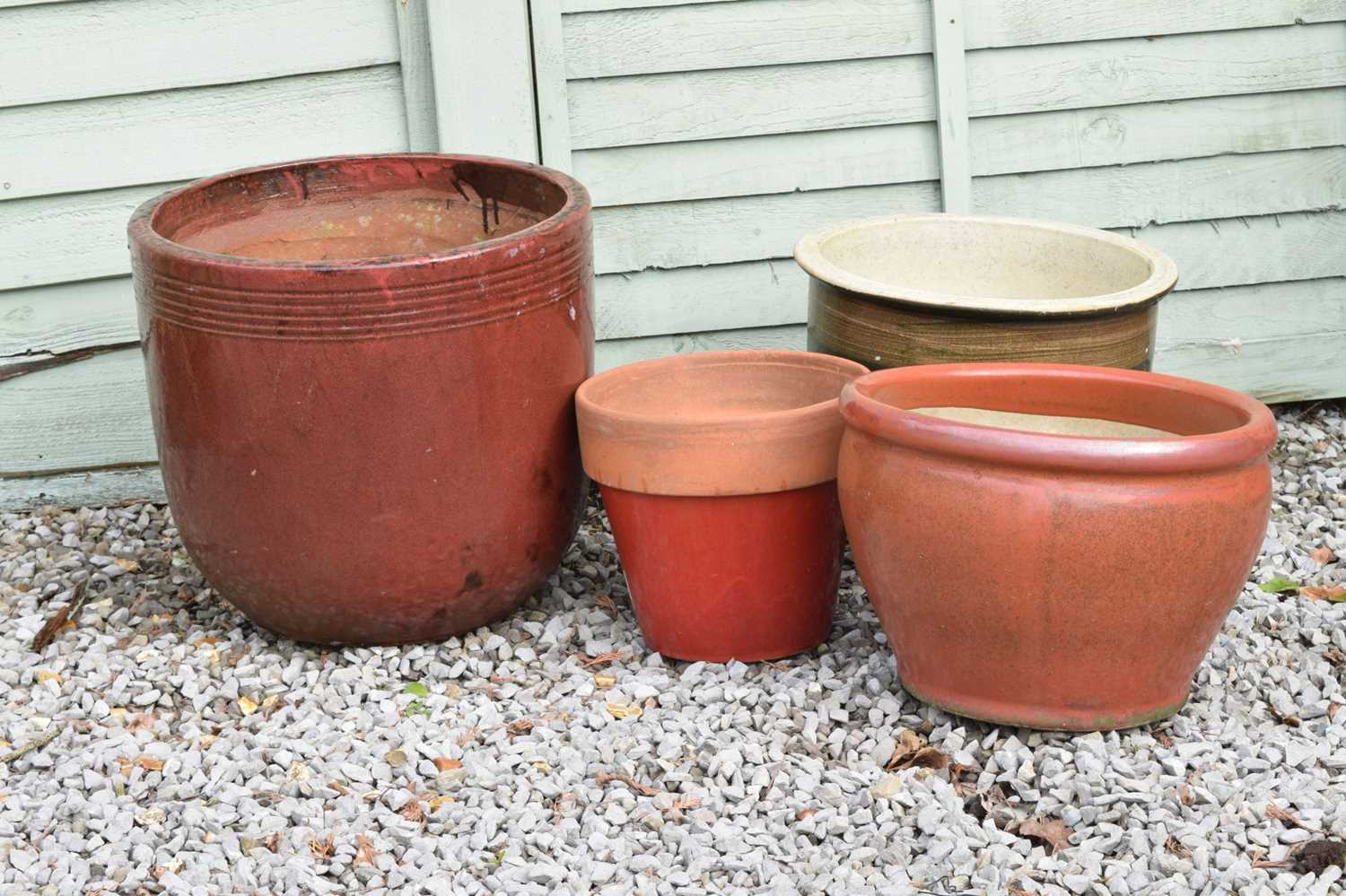 Three red glazed terracotta garden planters and a brown glazed example - Image 2 of 6