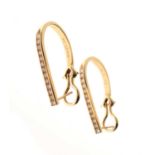 Pair of yellow metal (14K) diamond-set earrings