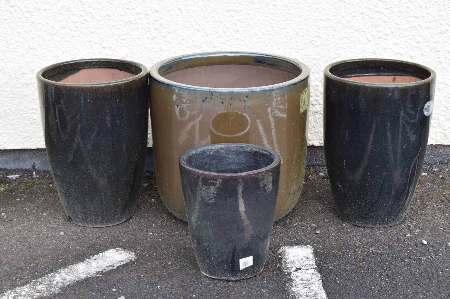 Four glazed garden planters/pots