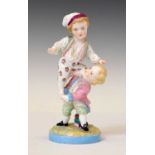 Early 20th century porcelain figure group of two children playing