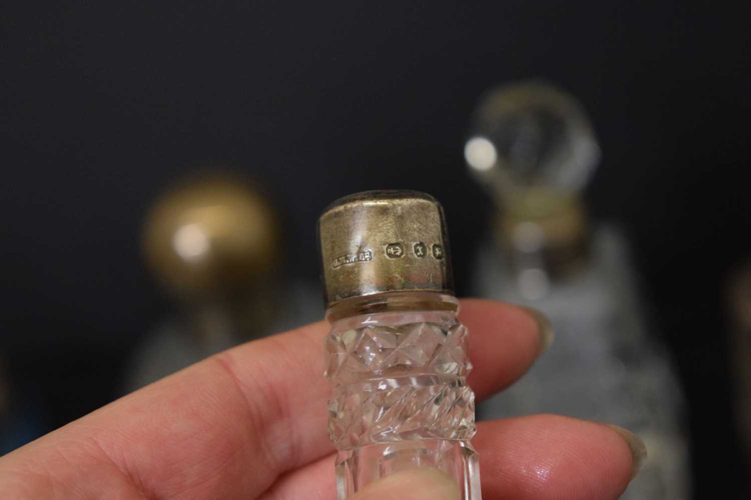 Quantity of mainly silver mounted and capped perfume and scent bottles - Image 8 of 10