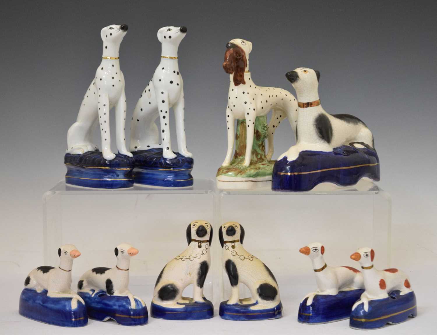 Group of assorted Staffordshire and Staffordshire-style dogs