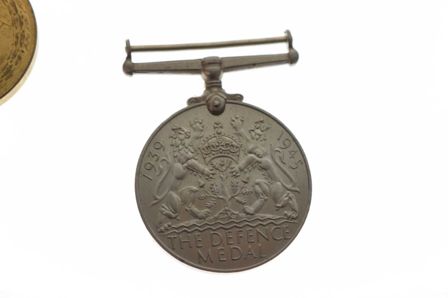 Two British First World War Victory Medals and Second World War Defence - Image 4 of 9