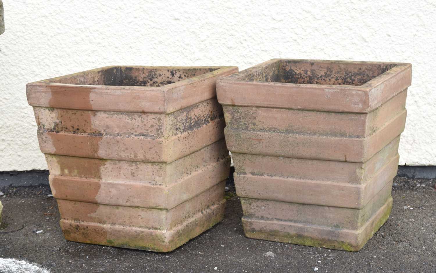 Pair of terracotta garden planters of square tapered form
