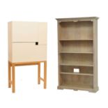 Modern compact desk , together with a lime-washed open bookcase