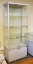 Modern glazed panelled and metal framed display cabinet