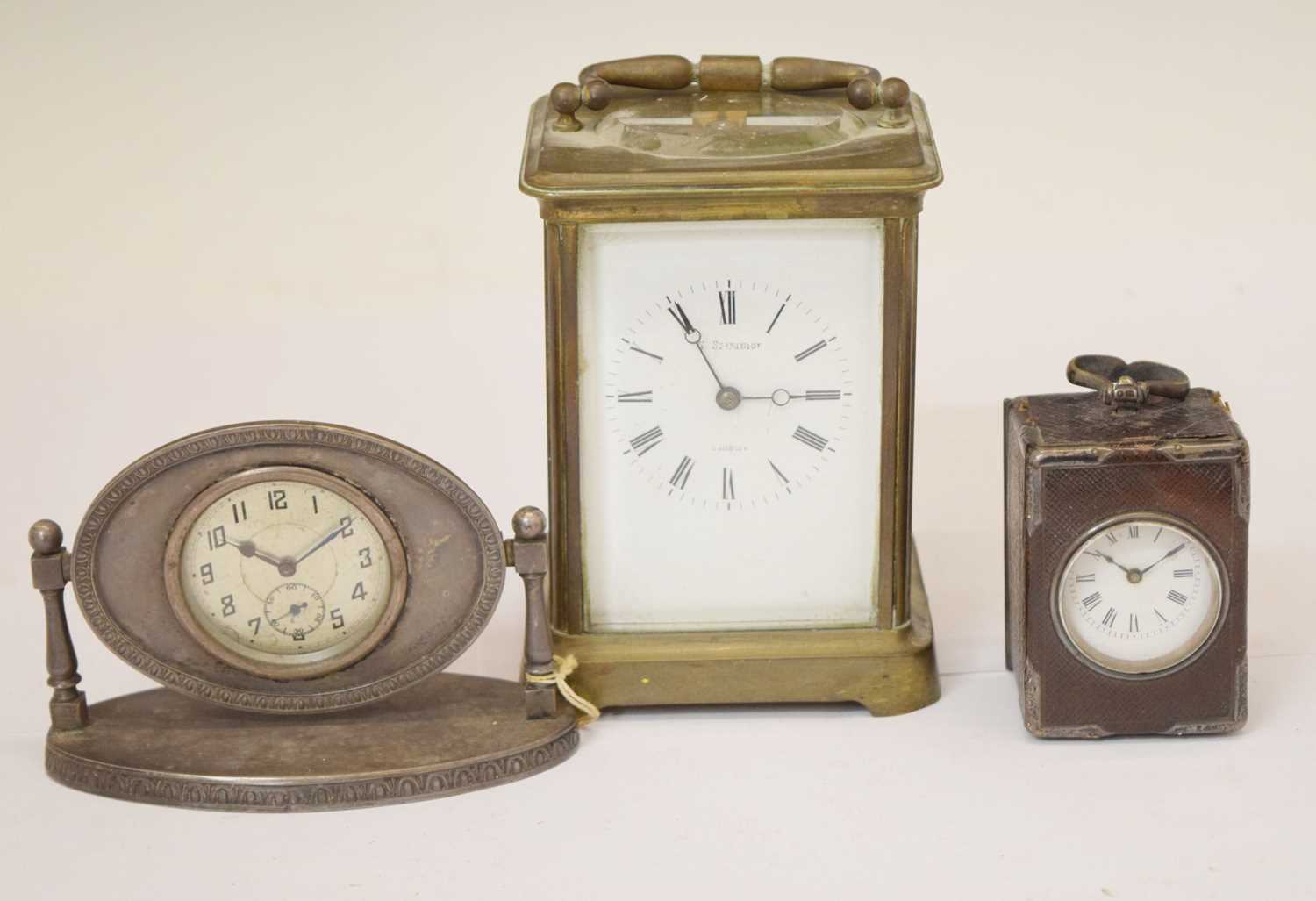 Two carriage timepieces and dressing table clock