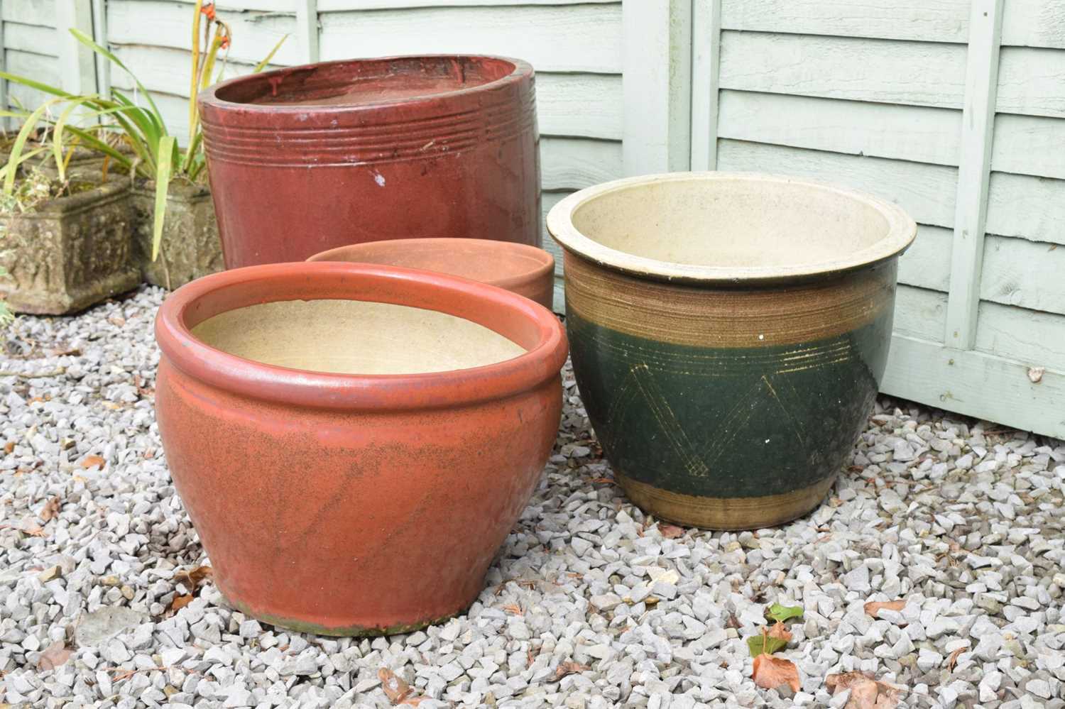 Three red glazed terracotta garden planters and a brown glazed example - Image 4 of 6