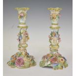 Pair of early 20th century Continental flower-encrusted candlesticks