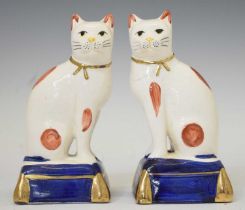 Pair of Staffordshire style seated cats