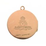 Royal Artillery 9ct gold circular locket