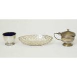 George V silver pierced bowl, and two silver condiments with blue glass liners