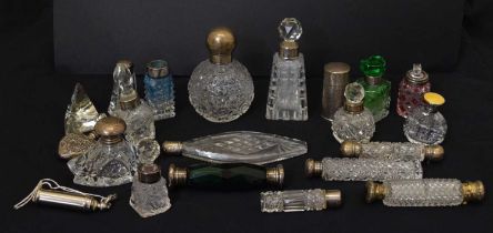Quantity of mainly silver mounted and capped perfume and scent bottles