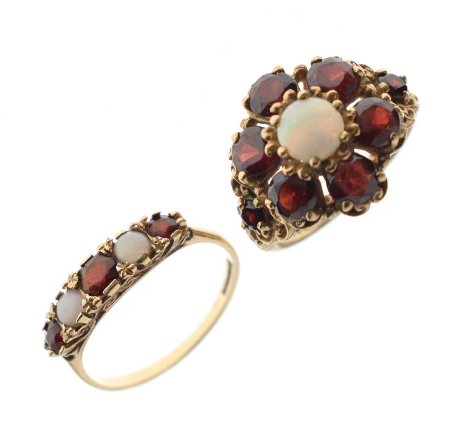 Two 9ct gold, garnet and opal dress rings