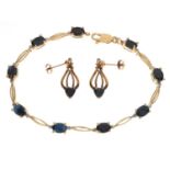 Yellow metal bracelet set nine oval sapphires, stamped '14K'