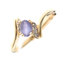 Tanzanite and diamond crossover dress ring