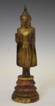 South East Asian carved giltwood standing Buddha