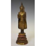 South East Asian carved giltwood standing Buddha