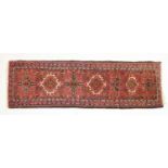 Middle Eastern red ground wool runner