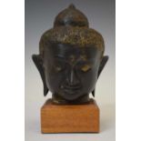 Bronzed bust of Buddha