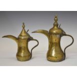 Two Turkish / Middle Eastern Islamic brass dallah coffee pots