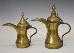 Two Turkish / Middle Eastern Islamic brass dallah coffee pots