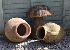 Two Mediterranean style garden urns plus wooden mushroom
