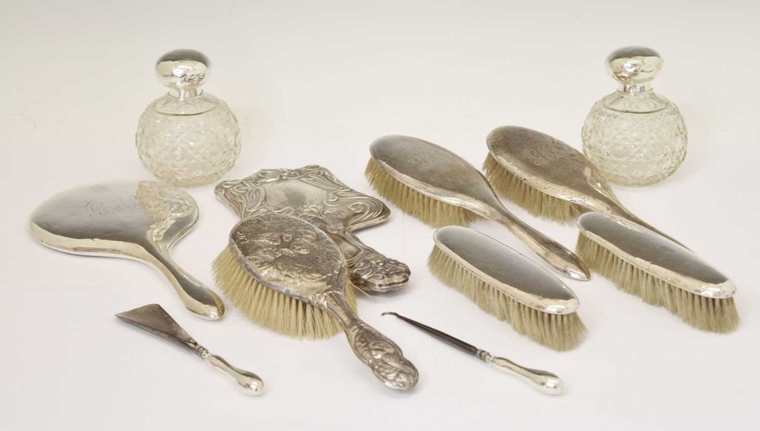 Collection of silver backed dressing table items and silver mounted jars, etc