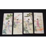 Four early 20th century Canton Famille Rose porcelain tiles