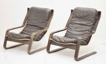 Pair 1970s slung armchairs with leather pad seats