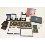 Five Royal Mint year packs, six Buckinghamshire Mint gilt medallions, etc