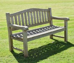 Two person teak garden bench with arched back