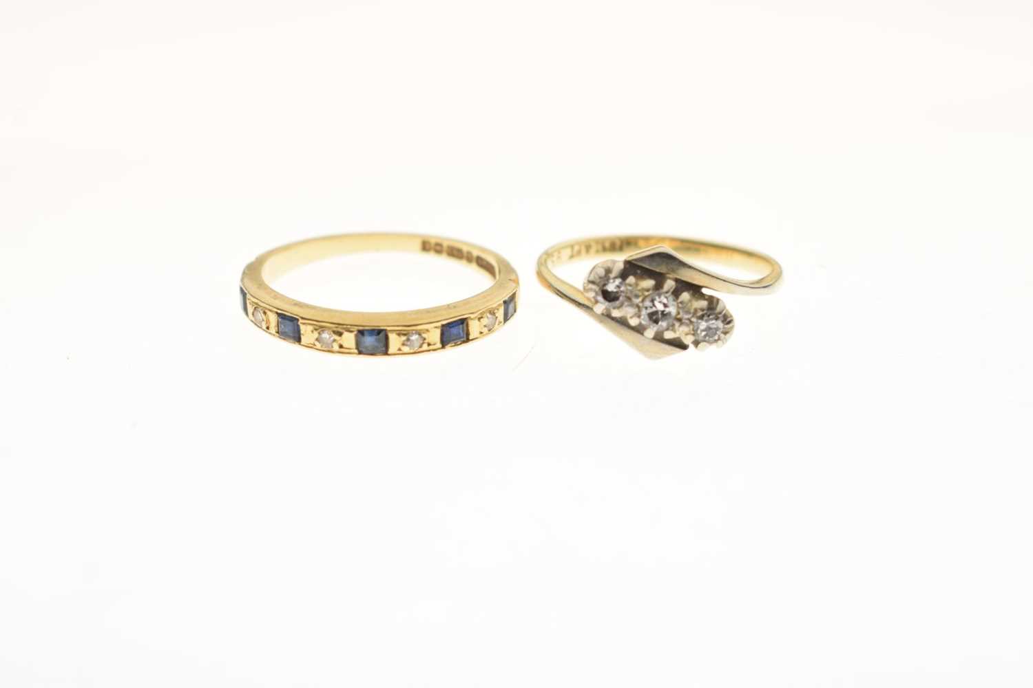 Diamond three-stone crossover ring, and a sapphire and diamond 18ct gold half eternity ring (2) - Image 2 of 6