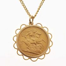 George V gold sovereign, 1912, in a 9ct surround