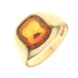 9ct gold ring set an orange-coloured faceted cushion-shaped stone