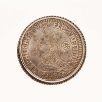 Elizabeth I silver shilling, 1562, in a white metal mount