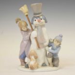 Lladro - Porcelain snowman figure group