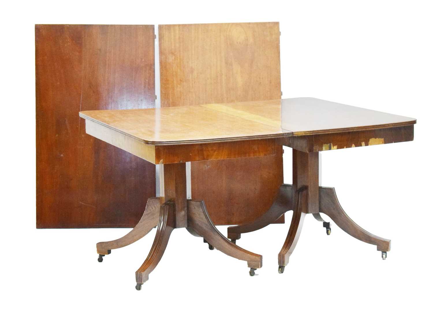 Late Georgian mahogany twin pillar extending dining table