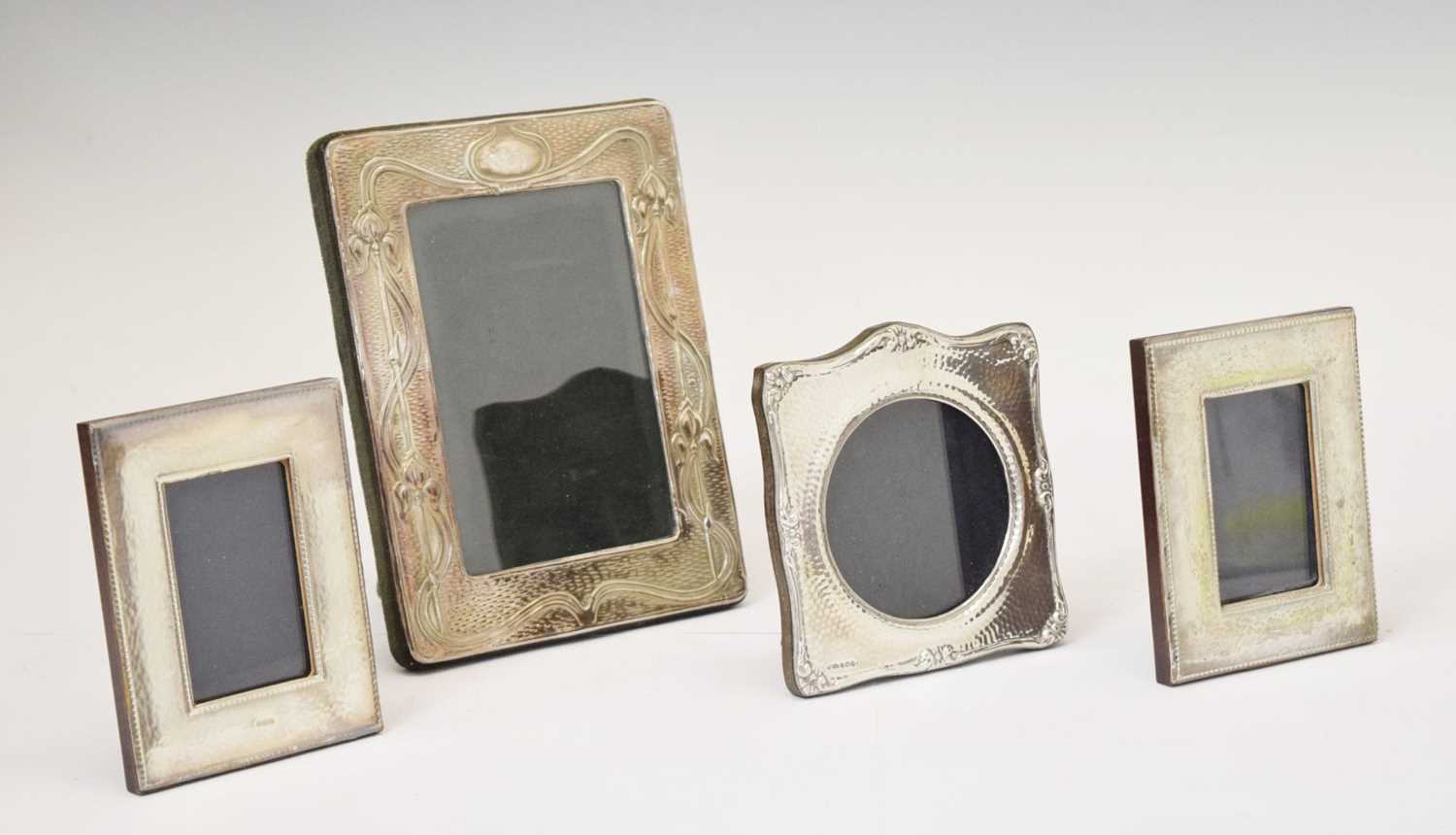 Four silver mounted easel photograph frames