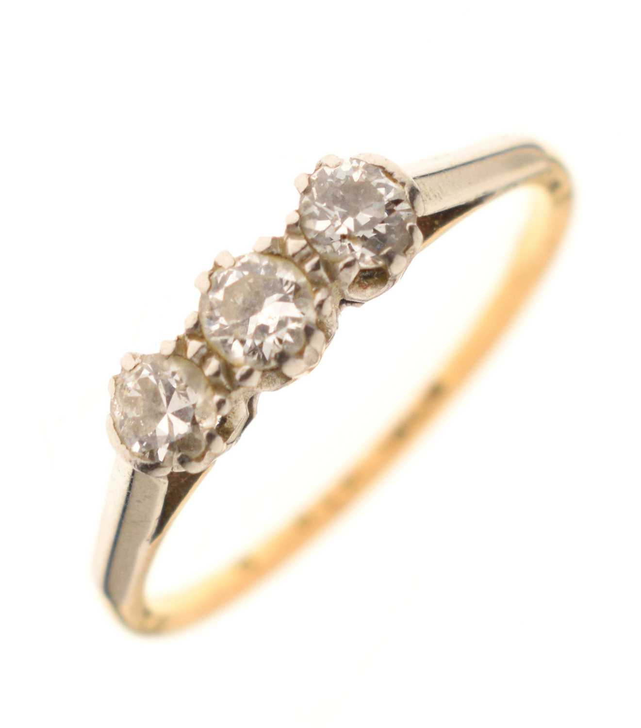 Diamond three-stone ring