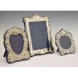 Three silver photograph frames