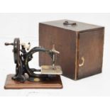 Late 19th century Willcox & Gibbs C-frame hand-cranked sewing machine