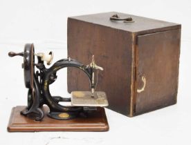 Late 19th century Willcox & Gibbs C-frame hand-cranked sewing machine