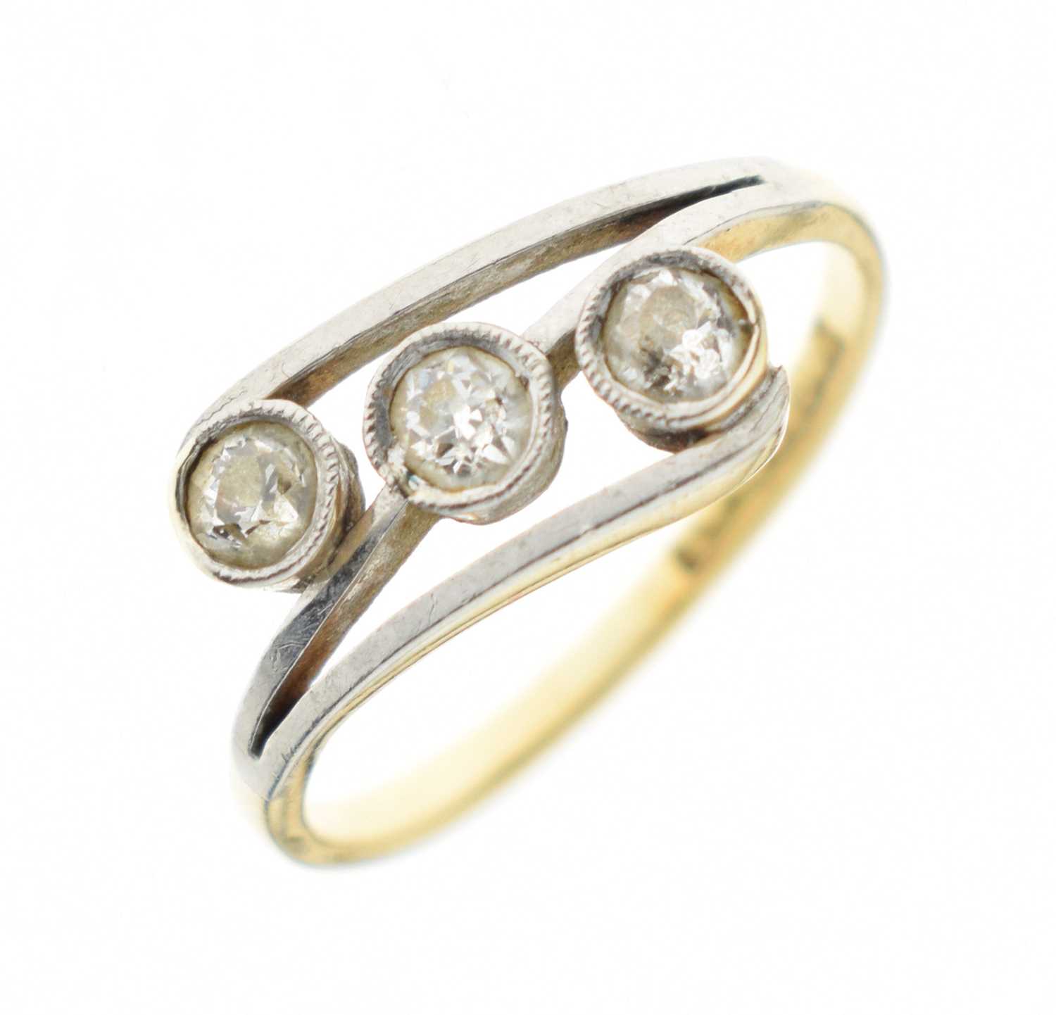 Diamond three-stone crossover ring